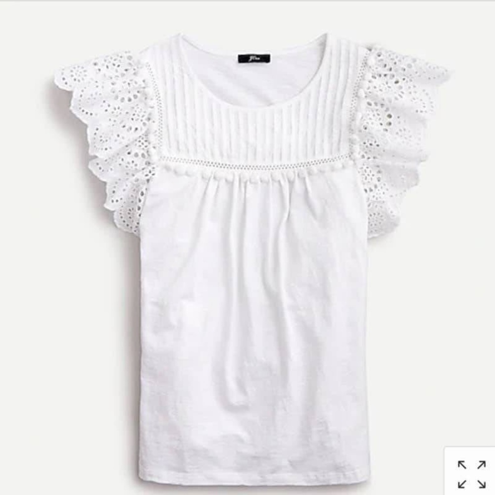 Eyelet flutter-sleeve top with pom-pom trim